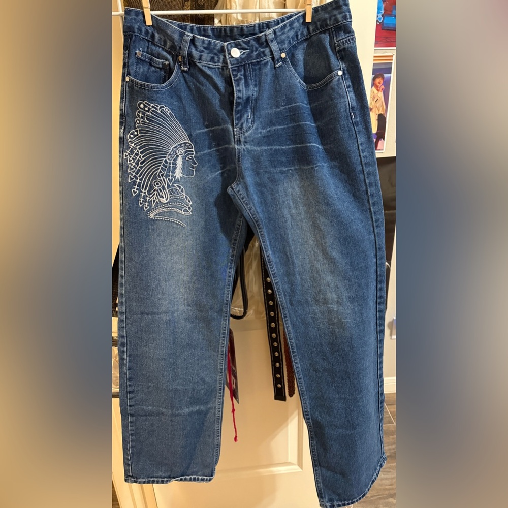 jeans with white embroidery